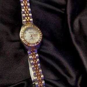 A gold and silver watch